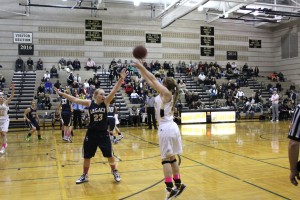 Junior PG Francesca Cendali fires a three in Monarch's game against Legacy High School on Friday, February 15th at Monarch High School. The Coyotes lost by a score of 53 to 47.