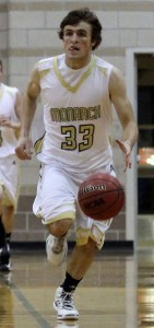 Jay MacIntyre drives to the basket against Legacy H.S on January 11th, 2013. The Coyotes won the game by a score of 59-42