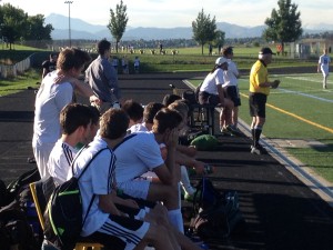 The Coyote bench looks on somberly during the second half of Tuesday's 8-0 loss at the hands of Boulder. The Coyote's moved to 0-2 in league play after losing to the defending state champs.