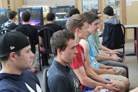 Senior Jackson Elliot battles senior Sam Horton in a friendly match of Super Smash Bros after being knocked out of the tournament.
