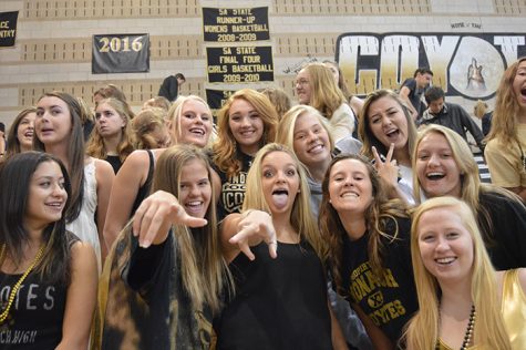 Senior girls pose at the Homecoming assembly.