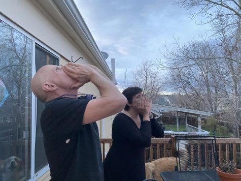 Monarch teachers Mr. and Mrs. Farrell howl on their back deck at 8:00 PM. This has become a nightly ritual from them and many others.