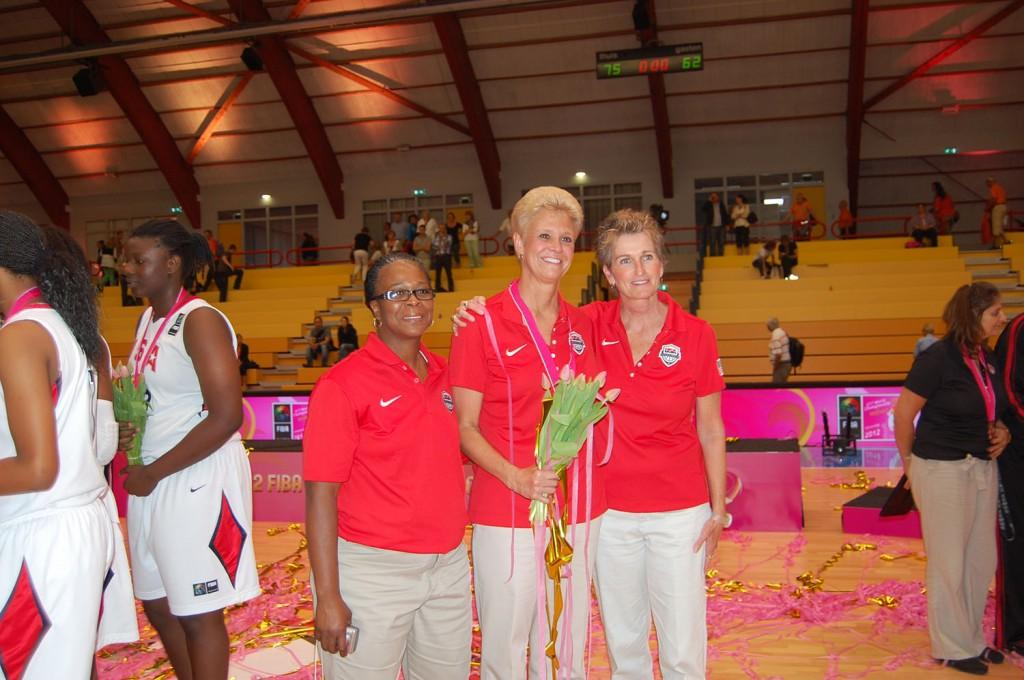Monarch head girls basketball coach Gail Hook poses with other coaches of the U-19 womens national team after winning the World Championships in Italy this summer.