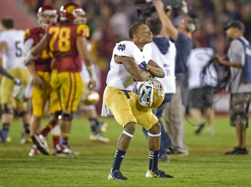 A Notre Dame player strikes a defiant pose as the Fighting Irish celebrate a 22-13 win over USC at the Los Angeles Coliseum on Saturday, November 24, 2012. Notre Dame will play for the National Championship on January 7th, 2013