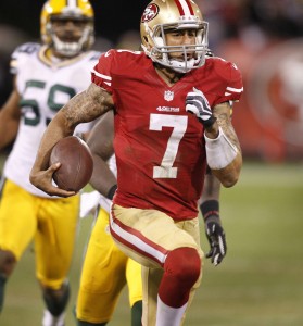 San Francisco 49ers quarterback Colin Kaepernick (7) runs for a touchdown in the third quarter as the San Francisco 49ers beat the Green Bay Packers in the NFC Divisional Playoff on Saturday, January 12, 2013.
