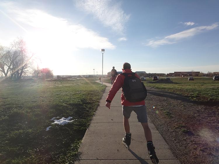 Senior Conner Lund roller blades to school and helps to decrease the amount of cars in Monarchs parking lot.