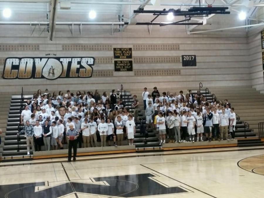 Monarchs+student+section+cheers+on+Monarch+boys+basketball+game+on+Friday+night.+The+boys+team+beat+Poudre+82-34+bringing+their+season+record+to+11-2.
