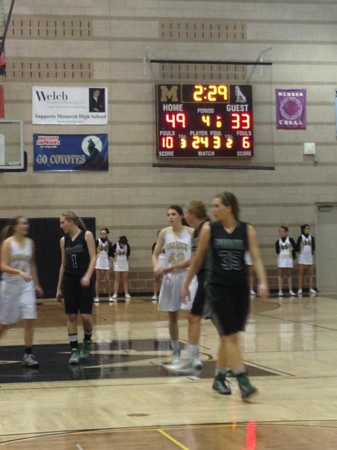 With 2;29 left in the game, number 42, Kelly OFlannigan hopes to receive the ball to lengthen Monarchs lead against Fossil Ridge.