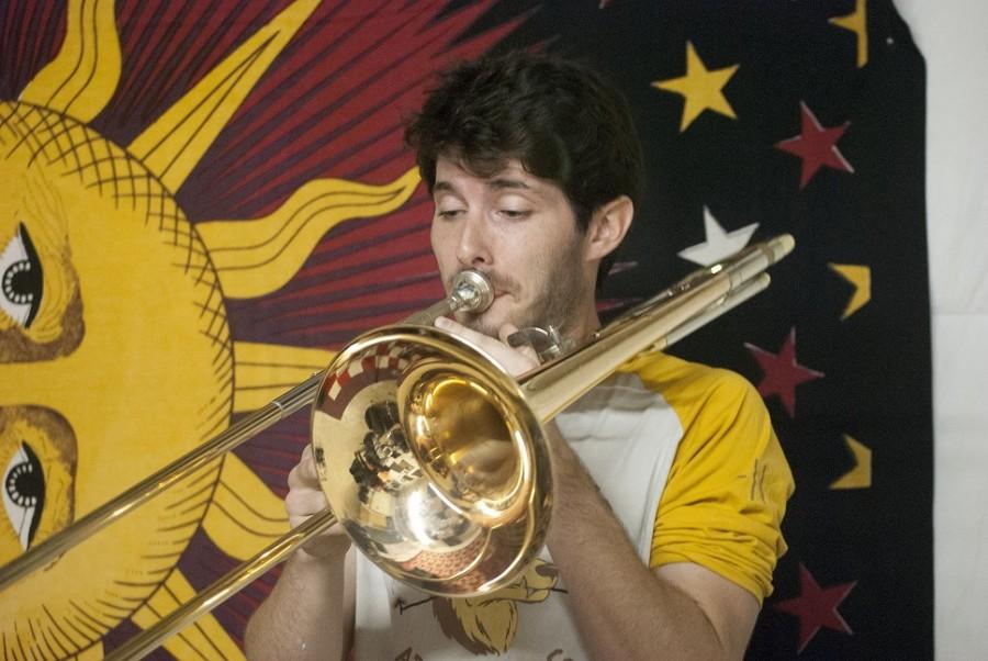 Tom Buswell playing the trombone.