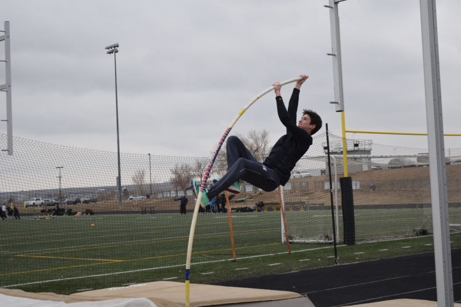 Tyler Rowan ‘24 practices his pole vault after school. He hopes to make it to state this season. Photo courtesy of Emmett Walsh