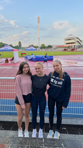 Vendy Petrinova stands with her friends in her home country, the Czech Republic. She ran track year-round and is now running cross country for Monarch.