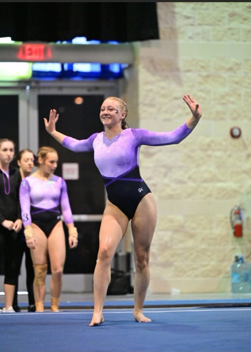 Natalie Burns hits the final pose of her floor routine, finishing off Nationals. On May 24, 2024, Natalie scored a 9.4 on her floor routine. Following a good season, Burns excitedly awaits the next Nationals she will compete in. Photo Courtesy of John Cheng.