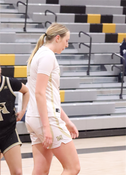 Sienna Williams (11) has set records for the girls basketball team.